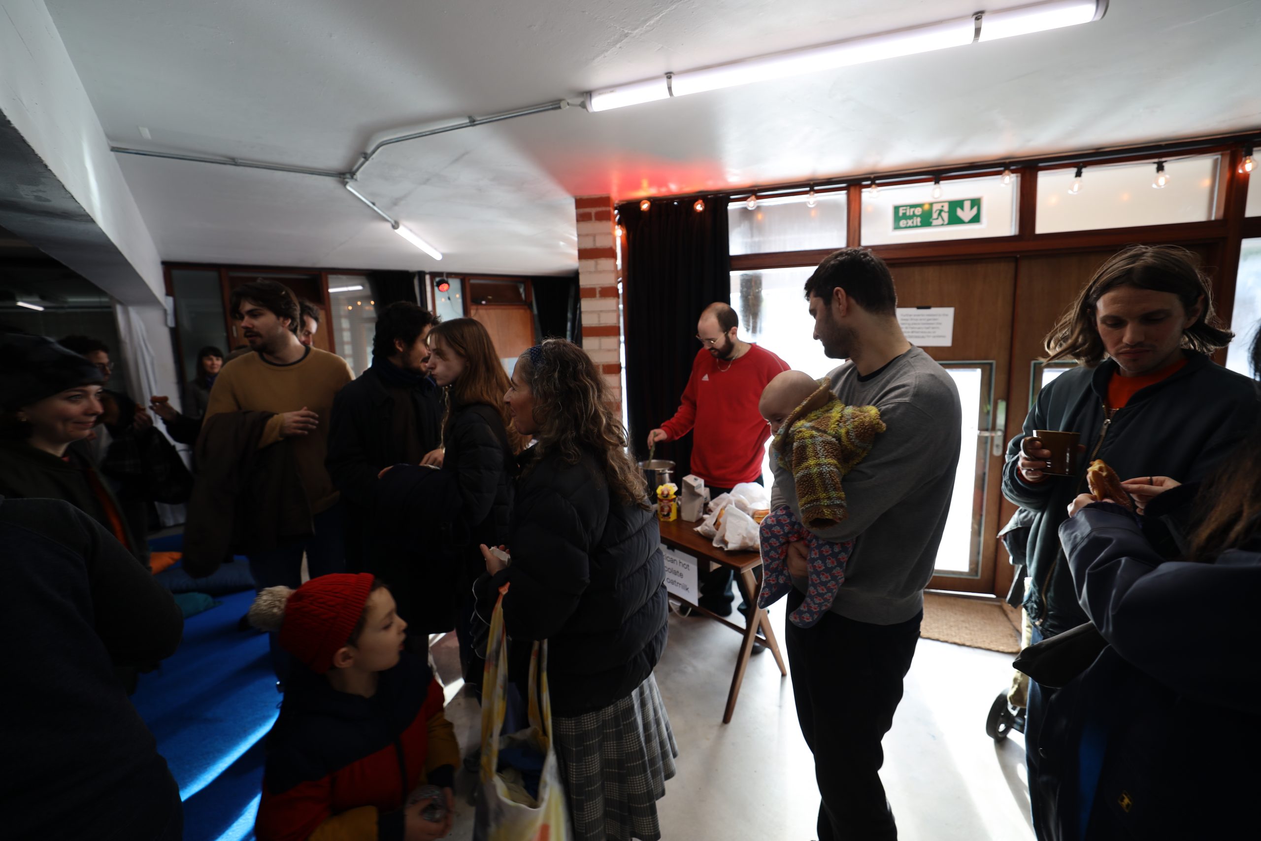 documentation of event showing visitors to the swap shop 